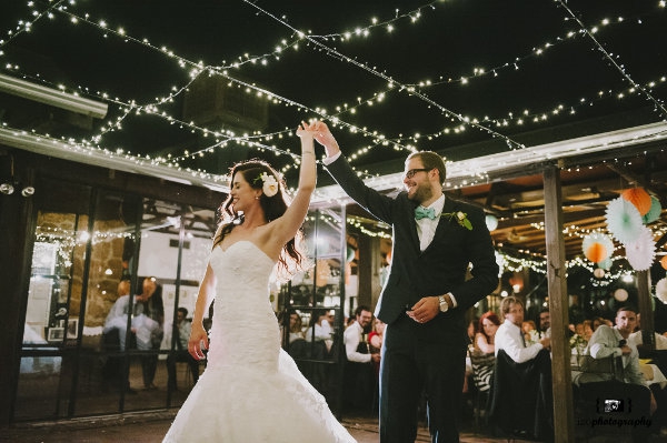 Dancing under the fairy light canopy